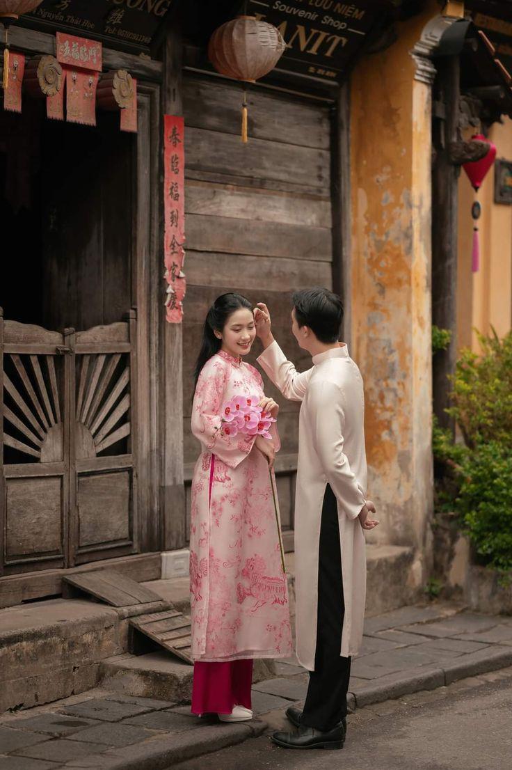 Chụp ảnh couple tết với concept áo dài hiện đại